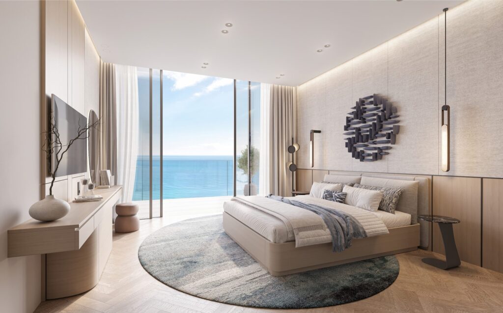 Luxury bedroom interior with sea view at Sheraton Residences Al Marjan Island Ras Al Khaimah
